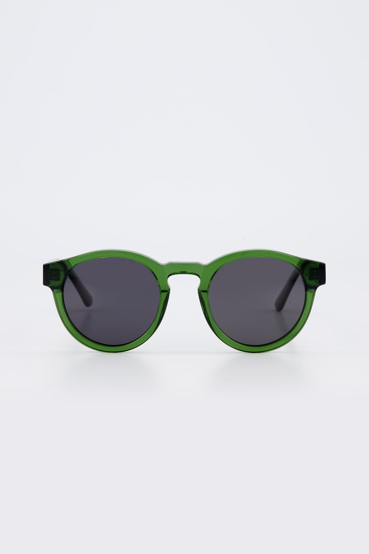 Front view of Isle of Eden Eddie Green Prescription unisex round bio-acetate eyeglasses against a white background.