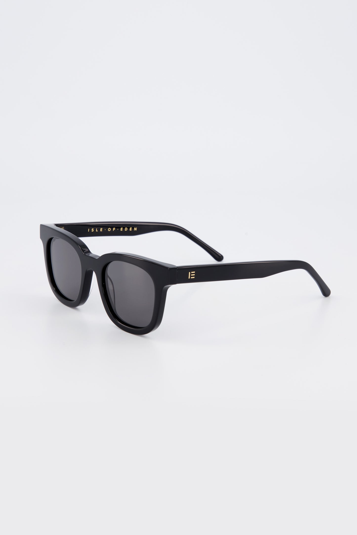 Isle of Eden Eugene black sunglasses, three-quarter angle showing flat brow square frame