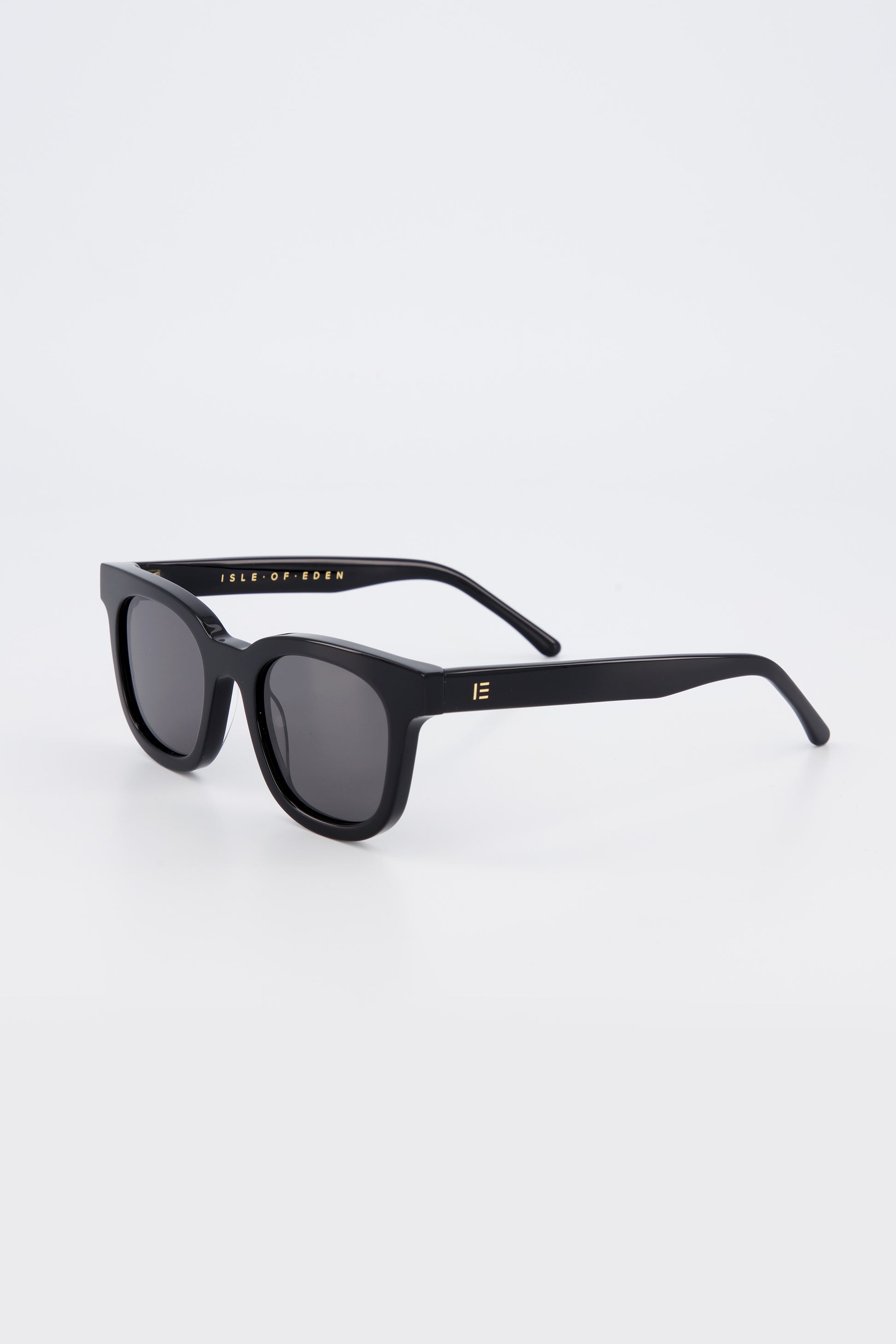 Isle of Eden Eugene black sunglasses, three-quarter angle showing flat brow square frame