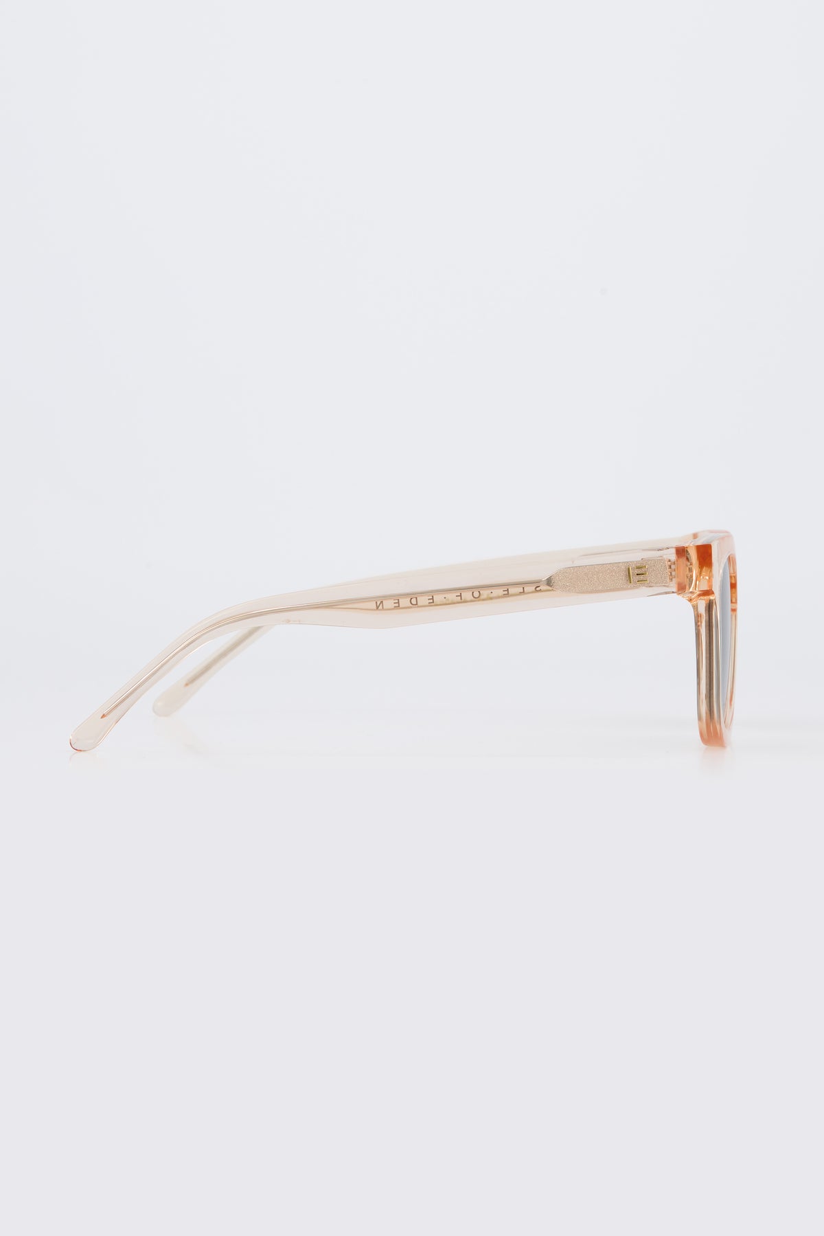 Isle of Eden Eugene champagne sunglasses, side profile view showing temple length and hinge detail