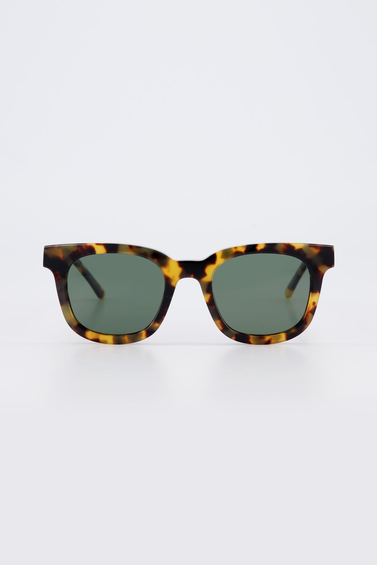 Isle of Eden Eugene tortoise sunglasses, front view showing flat brow square frame and green lenses