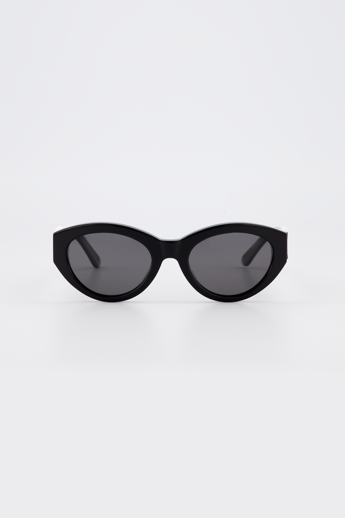 Isle of Eden Felina black sunglasses, front view showing cat-eye frame and dark lenses