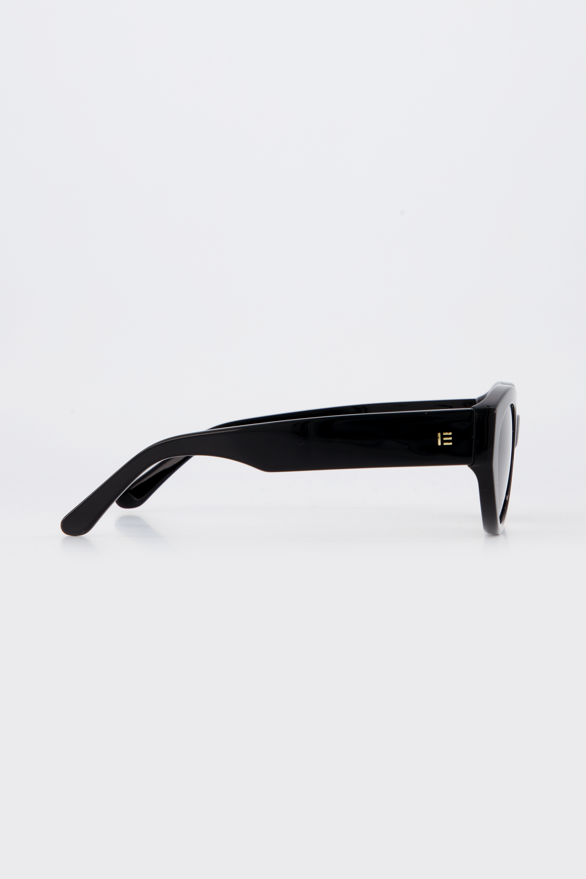 Isle of Eden Felina black sunglasses, side profile view showing temple length and hinge detail