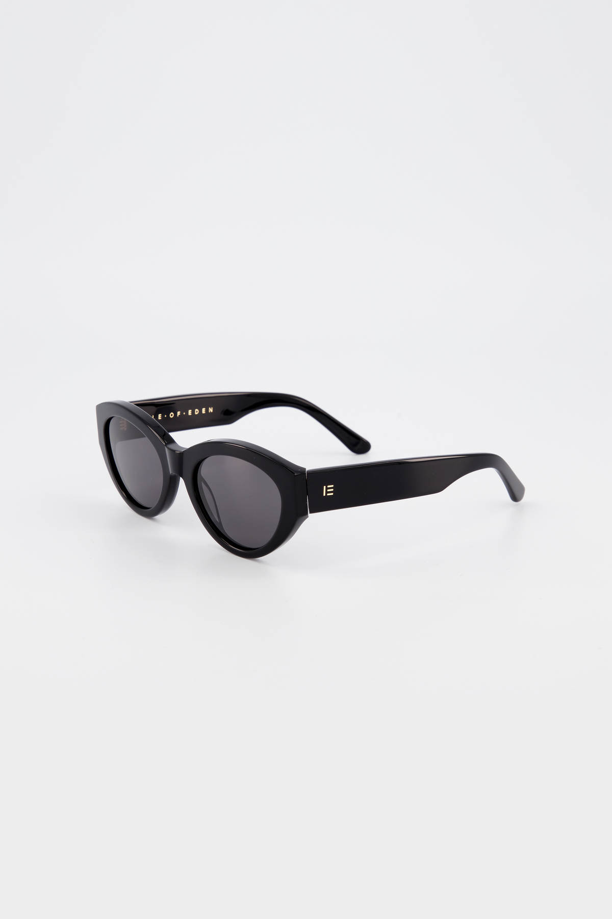 Isle of Eden Felina black sunglasses, three-quarter angle showing cat-eye frame