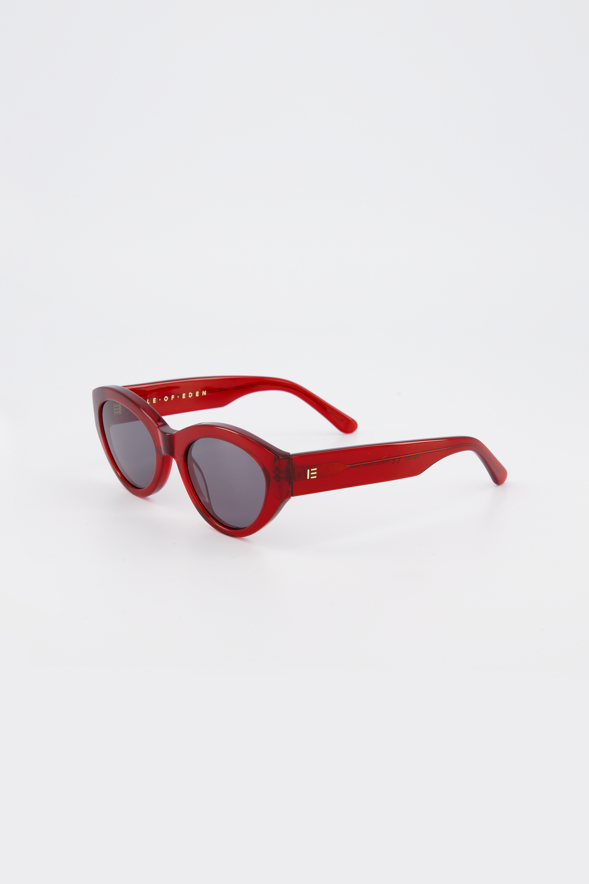 Isle of Eden Felina red sunglasses, three-quarter angle showing cat-eye frame