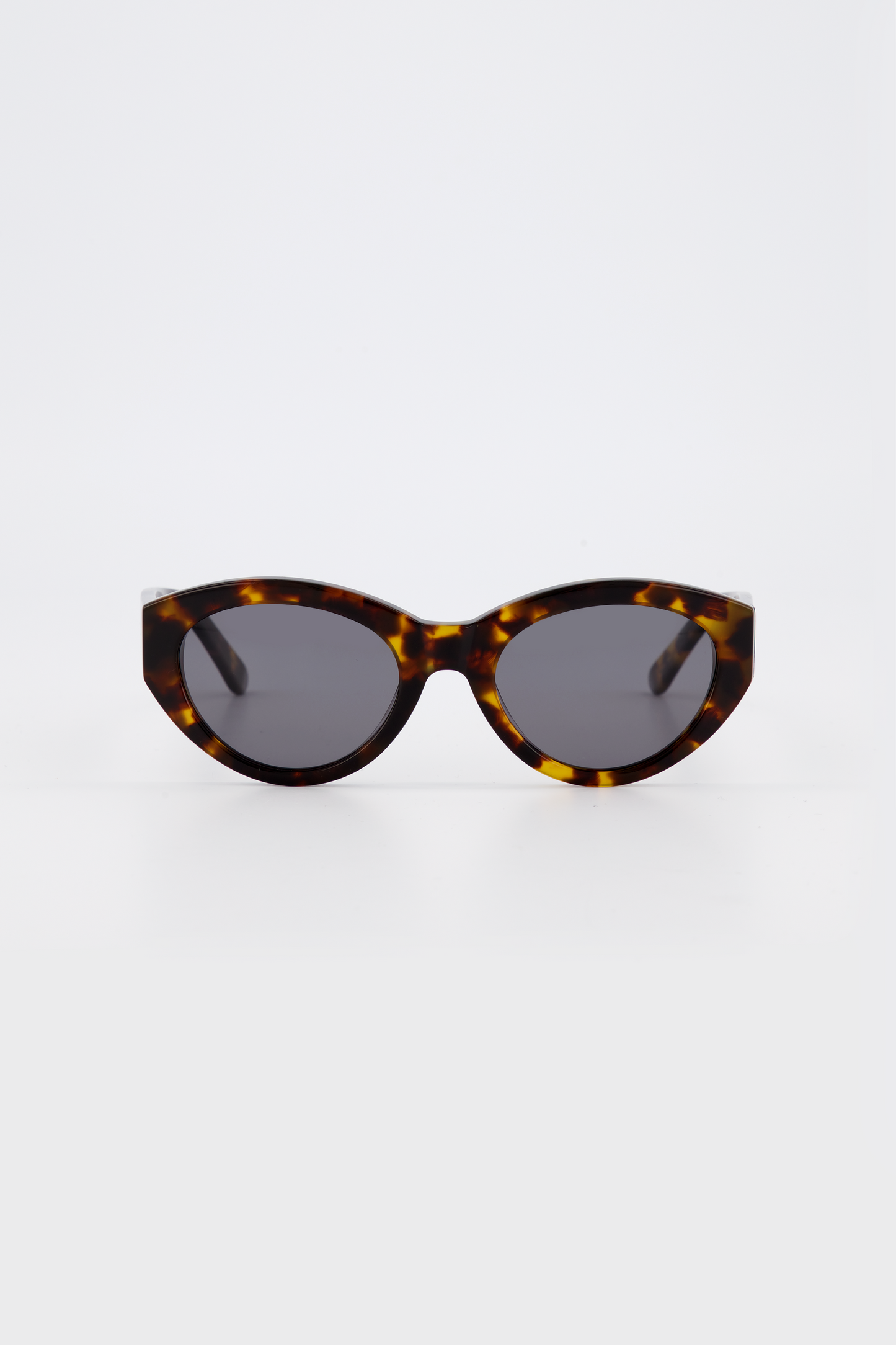 Isle of Eden Felina tortoise sunglasses, front view showing cat-eye frame and dark lenses