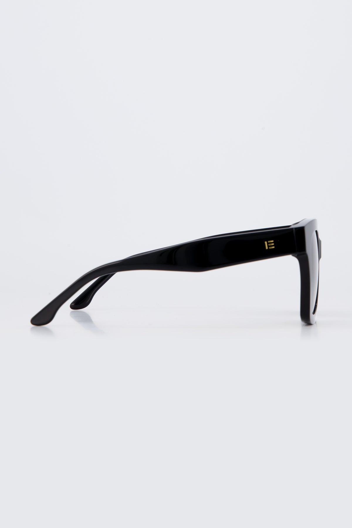 Isle of Eden Maleika black sunglasses, side profile view showing temple length and hinge detail
