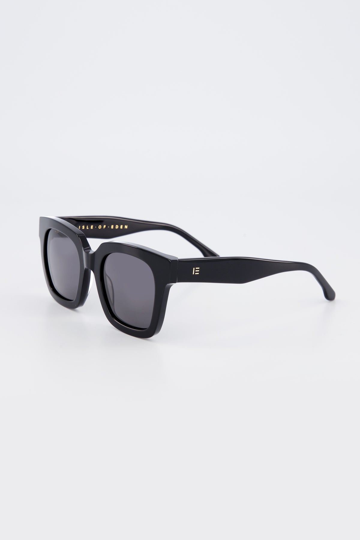 Isle of Eden Maleika black sunglasses, three-quarter angle showing oversized frame