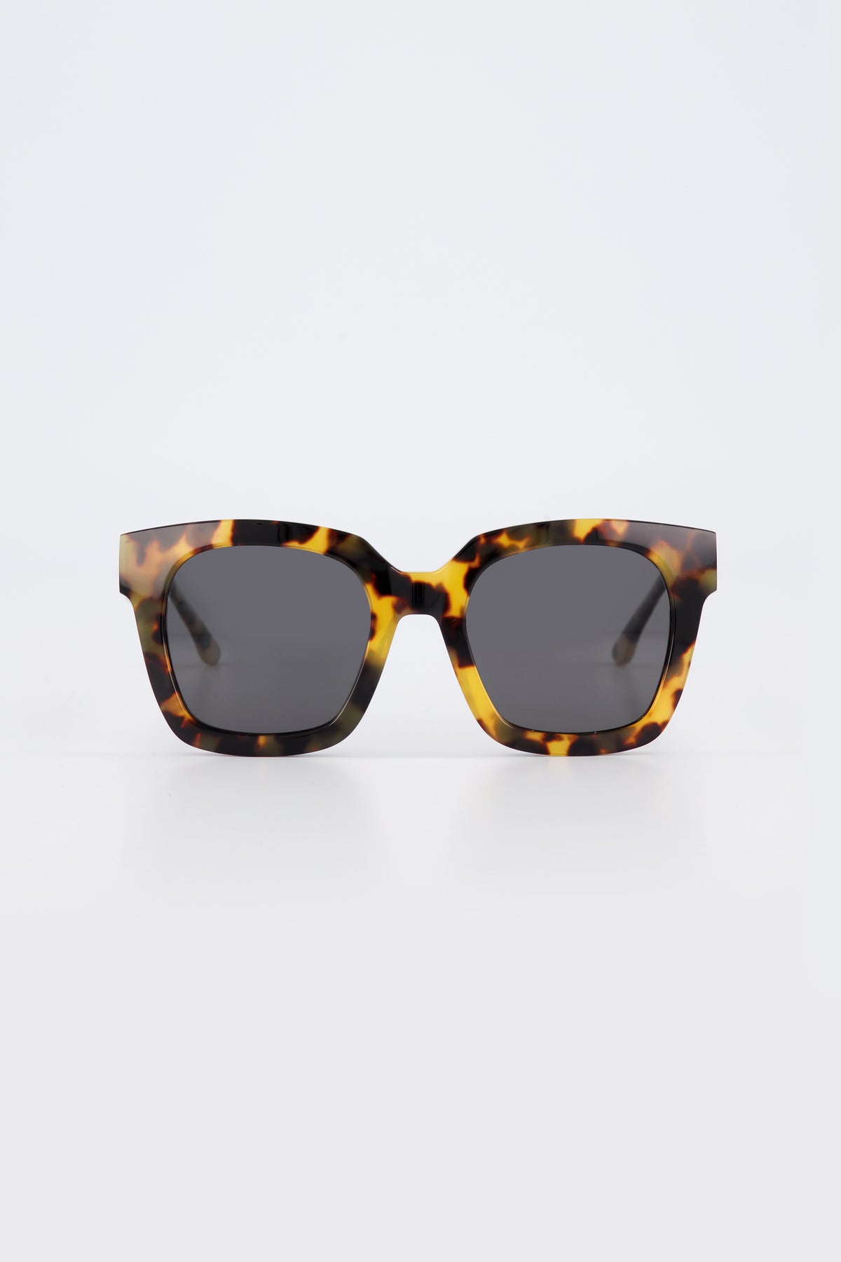 Isle of Eden Maleika tortoise sunglasses, front view showing oversized frame and dark lenses