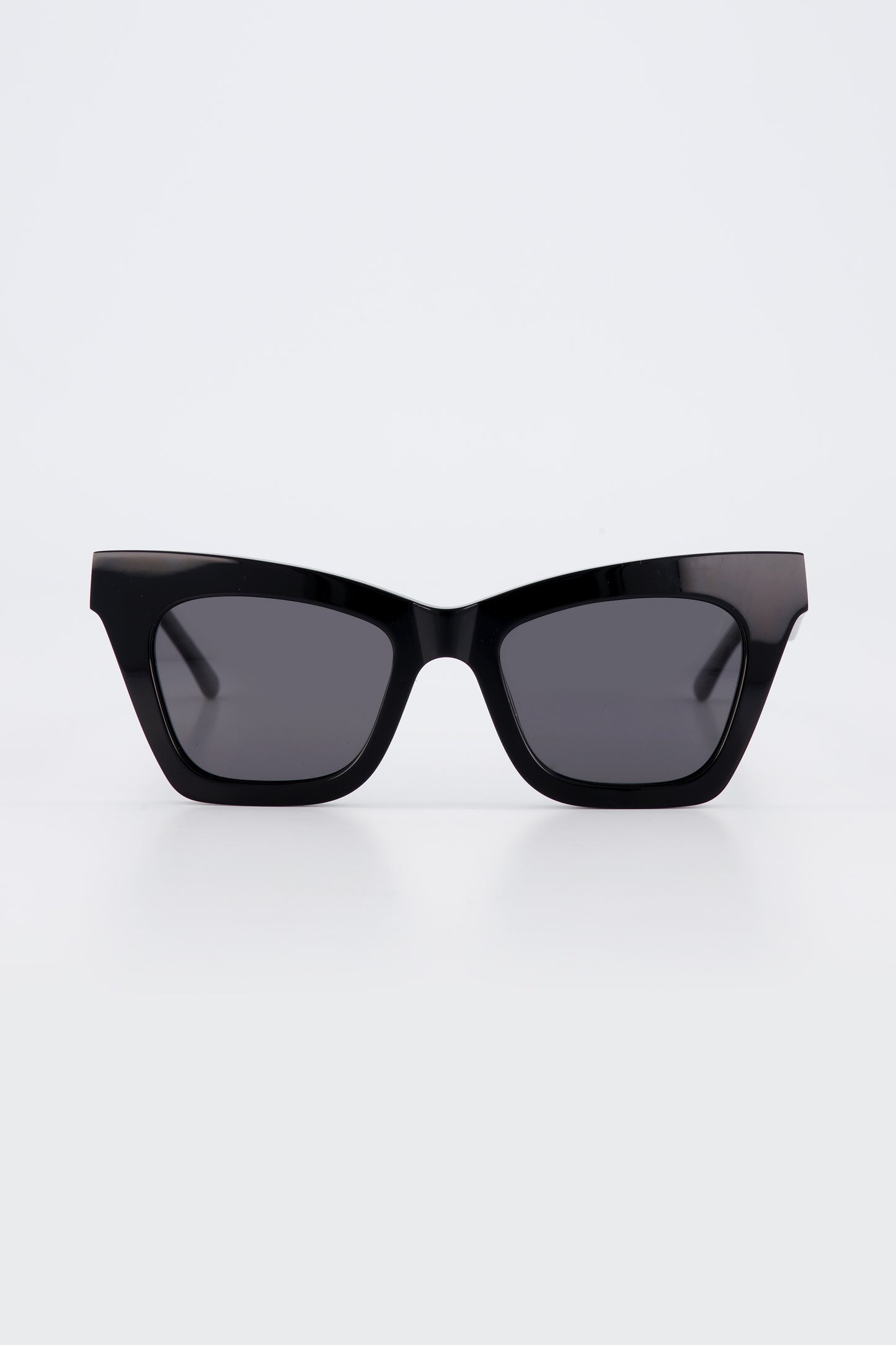 Isle of Eden Sienna black sunglasses, front view showing angular cat-eye frame and dark lenses