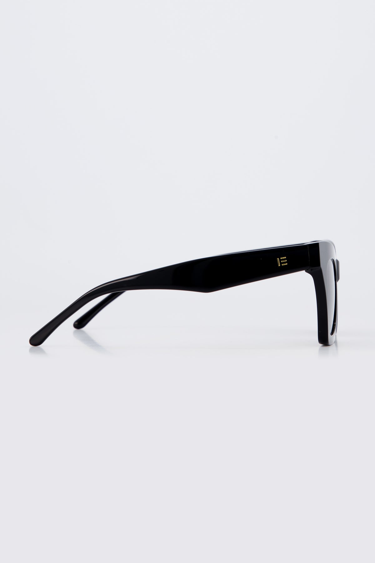 Isle of Eden Sienna black sunglasses, side profile view showing temple length and hinge detail