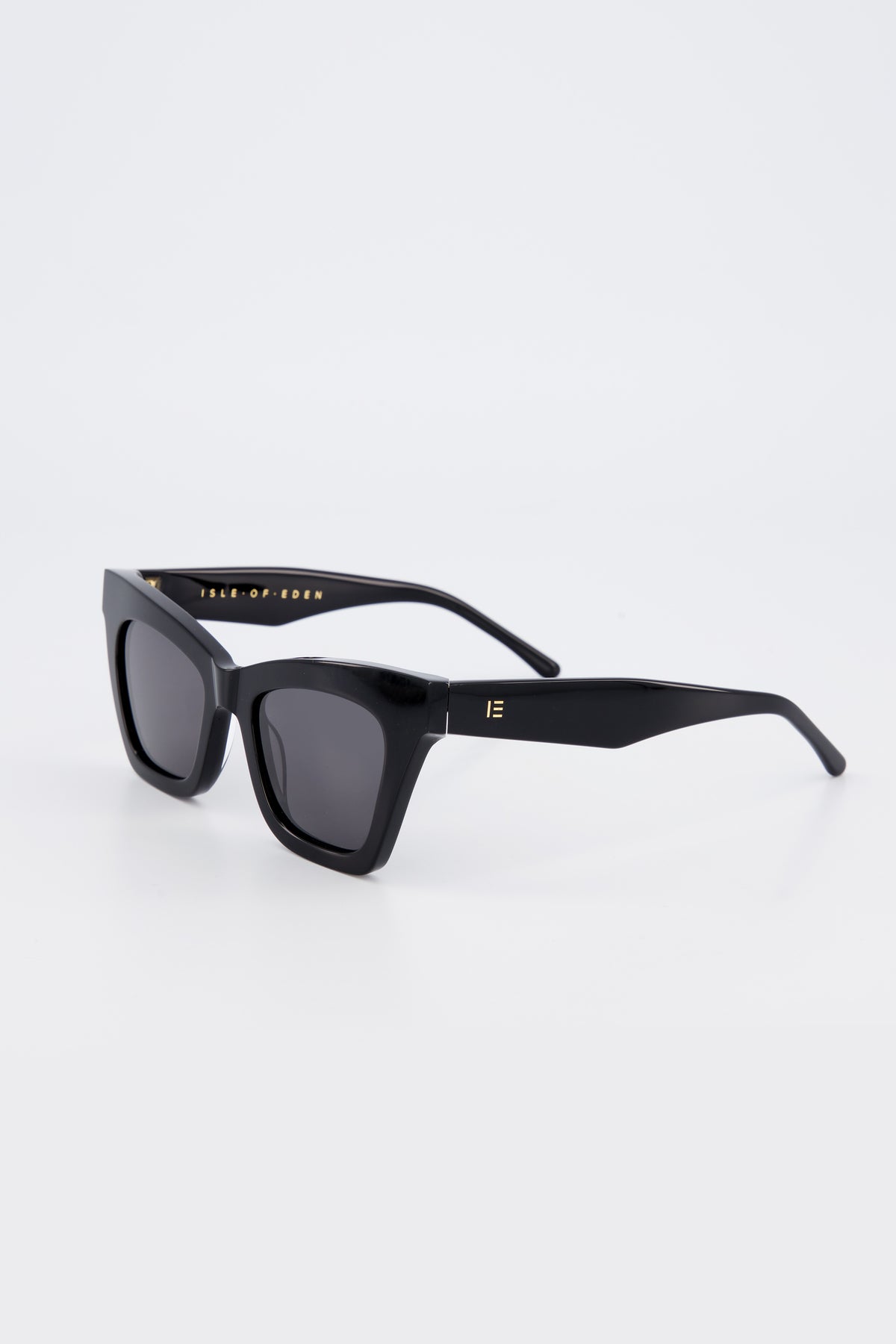 Isle of Eden Sienna black sunglasses, three-quarter angle showing angular cat-eye frame