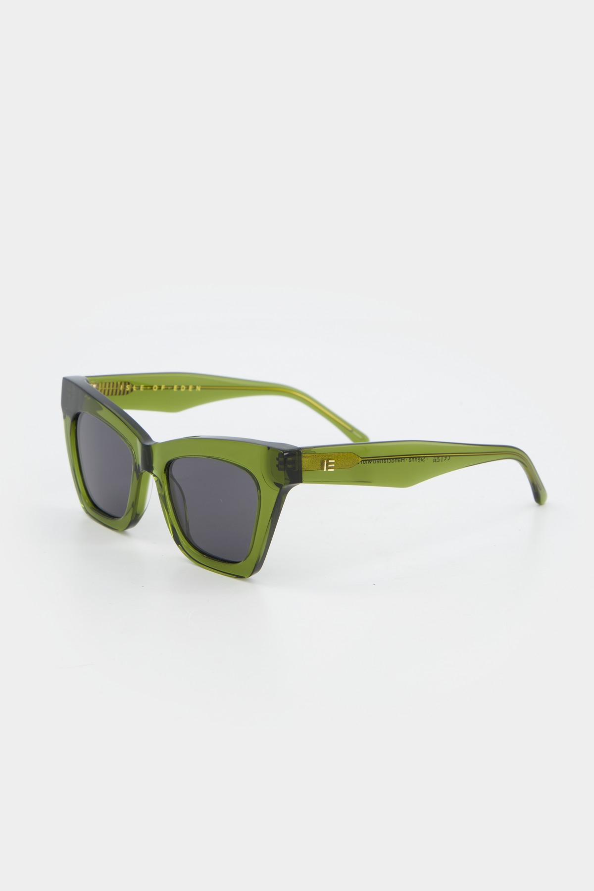 Isle of Eden Sienna bottle green sunglasses, three-quarter angle showing angular cat-eye frame
