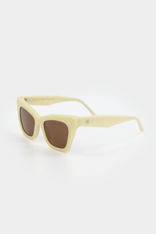 Isle of Eden Sienna ivory sunglasses, three-quarter angle showing angular cat-eye frame